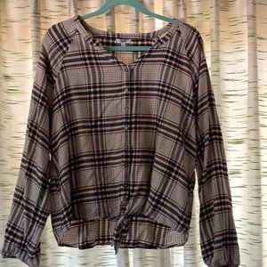 Brown and beige plaid flannel material long sleeve.